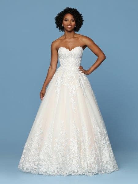 African american woman in embroidered wedding dress